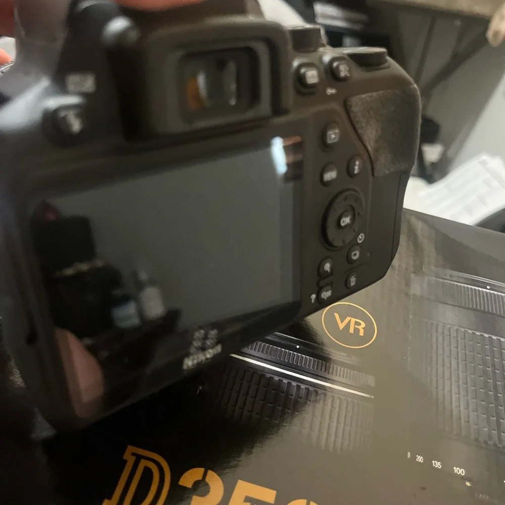 Nikon D3500 DSLR Camera with Black and Gold Accents
